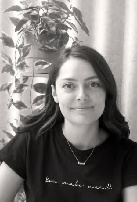 Emily Kirkham smiling.