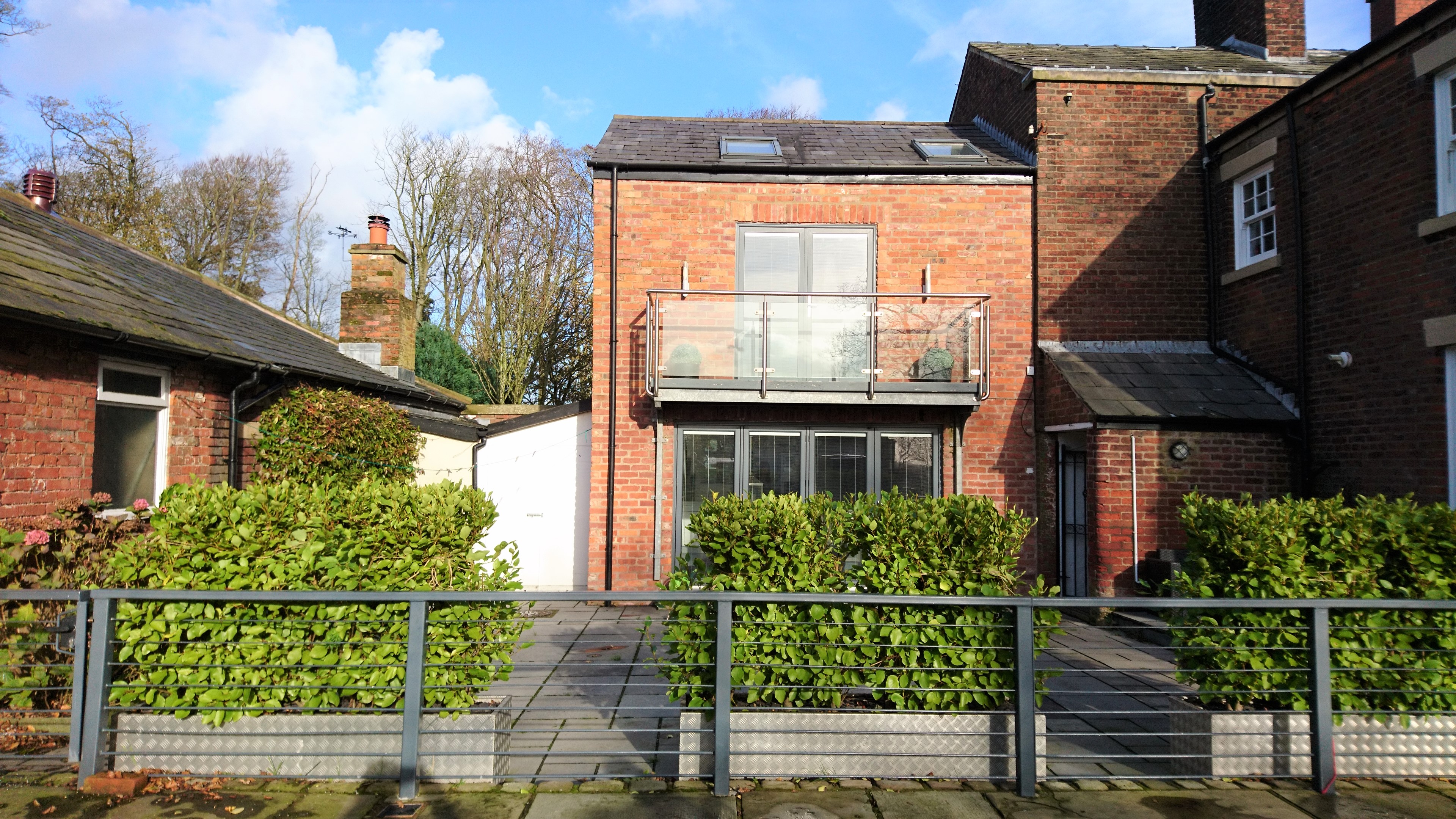 Iridescent ripples of a bright blue and pink liquid